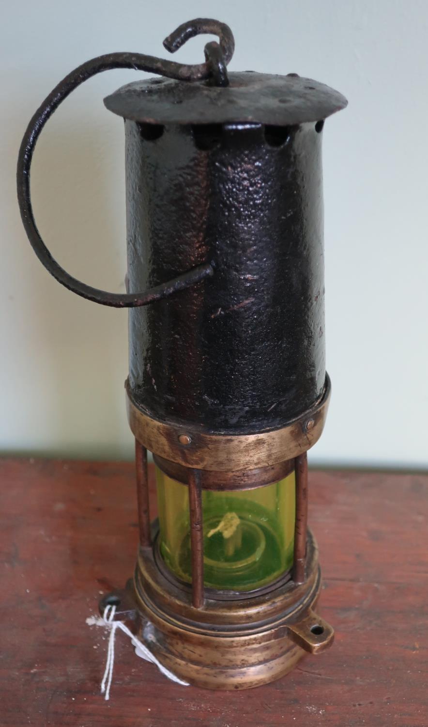 Miners type lamp with brass mounts