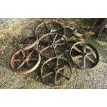 Selection of eight various cast metal wheels of various sizes