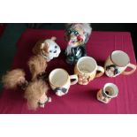 Four novelty topless lady mugs, three nodding head trolls, a nodding head Churchill dog figure and a