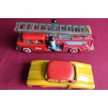 Tinplate STI fire engine and a tinplate car (2)