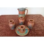 Group of three Victorian prattware terracotta ink style bottles with registration marks to the