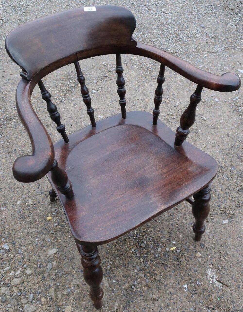 Late Victorian Captains style chair with turned supports and double H shaped under stretcher