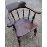 Late Victorian Captains style chair with turned supports and double H shaped under stretcher