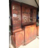 19th C mahogany breakfront bookcase by Gillows with upper central section enclosed by two glazed