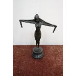 Modern Art Deco style bronze figure of a dancing girl with arms outspread, on turned marble base (