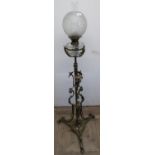 19th/20th C brass telescopic oil floor lamp with adjustable height column, clear glass reservoir and