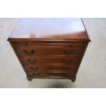 Superb quality reproduction mahogany cross banded dwarf bachelors chest, with slide above four