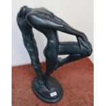 Modern design large cast figure of a long haired reclining nude lady, with traces of signature to