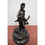 Bronze figure of a shooter and his dog, on turned marble base (height 35cm)