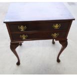 Mahogany two drawer side table on cabriole supports (63.5cm x 42.5cm x 72.5cm)