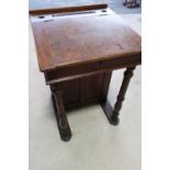 19th C elm clerks desk with hinged lift up top, on turned supports (66cm x 66cm x 98cm)