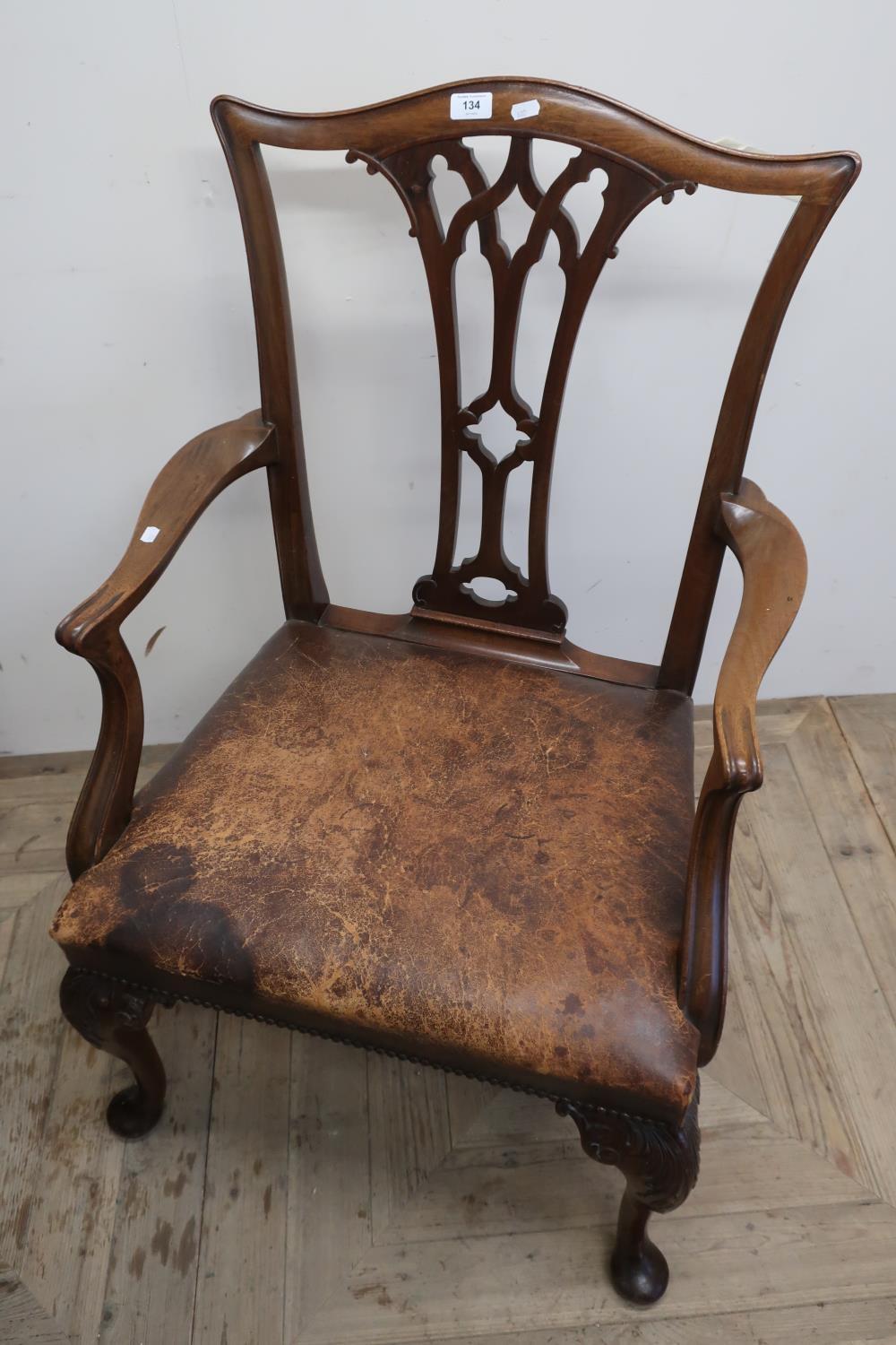 Mahogany framed wide seated armchair on cabriole supports and leather upholstered seat