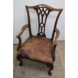 Mahogany framed wide seated armchair on cabriole supports and leather upholstered seat