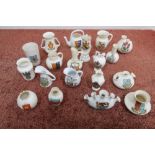 Approximately fifty pieces of souvenir crested china some by Arcadian and Carlton china