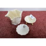 Two pieces of Belleek shell shaped pottery and one other (3)