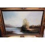 Large gilt framed oil on canvas landscape scene of fisherman on mountainous lakeside, signed C.