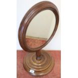 Victorian mahogany circular toilet mirror on turned circular base (55cm high)