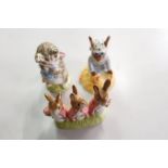 Beswick Beatrix Potter 'Miss Moppet', a Beswick Beatrix Potter figure 'Flopsy, Mopsy and Cottontail'