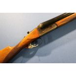 Larona 12 bore side by side shotgun, with 27 3/4 inch barrels, colour hardened action stock, 14 1/