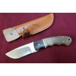 Boxed as new Elk Ridge sheath knife with leather sheath with wooden grips ER-128
