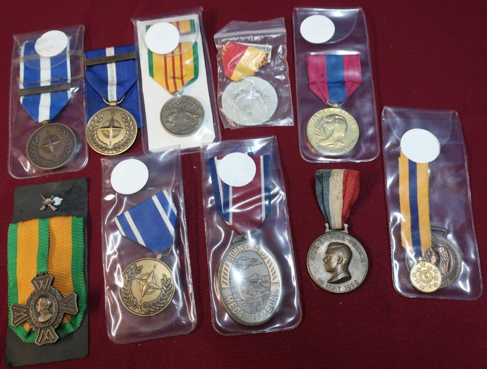 Group of ten various foreign and national medals including Nato, Kosovo and Non Article 5, French