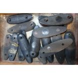 Approximately fifteen shotgun butt plates for various makes, including Baretta, Suhl, SKB,