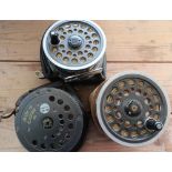 Two cased Daiwa 813 salmon rod and one spare spool