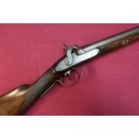 10 bore flintlock cap sporting gun with 27 1/2 inch damascus barrels, the lock marked Harvey Exeter