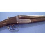 Hanson 12 bore side by side ejector shotgun with 28 inch barrels with engraved detail to the top rib