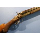 Belgium 12 bore hammer gun with 30 inch barrels and 14 inch pistol grip stock, serial no. 57461 with