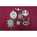 Small selection of Scottish cap badges including Highland Light Infantry and two Soviet Union enamel