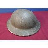 British circa WWII steel helmet with liner and chinstrap