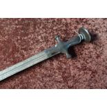 Indian Tulwar type sword with curved 28 1/2 inch double fullered blade and disc shaped pommel