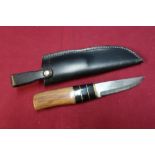 Small Sheffield made sheath knife with 3 1/2 inch Damascus blade, wooden horn and brass grips