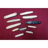 Collection of eleven various assorted vintage pocket knives including ivory gripped, mother of