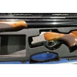 Cased Browning 525 12 bore over and under ejector shotgun with 30 inch multi choke barrels, 14 3/4