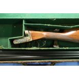 Cased W.W.Greener Empire Model 12 bore side by side ejector shotgun with 28 inch barrels, choke 1/