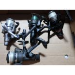 Four reels including Shakespeare Pro Carbon 229, Spitfire 5DRD, SL Elbass 30 and a Abu Garcia (The