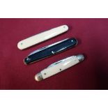 Group of three various vintage pocket knives, one with ivory grips