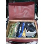 Brown tackle box with contents including DVD fishing collection, reels, torches etc