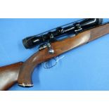 H & H Mag Mauser .30 bolt action rifle with Redfield scope, serial no. 31601 (section 1