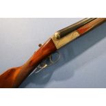 Spanish 12 bore side by side ejector shotgun, with 26 inch barrels marked Quinton, 14 1/4 inch