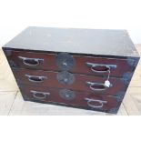 Japanese lacquered three drawer amour chest with various wrought metal strap work and carry