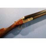 W.W.Greener Grade E16 12 bore side by side shotgun with 26 1/2 inch barrels, choke is IC and full,