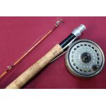 Two piece Hardys split cane fly rod with a rim fly kingsize reel