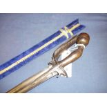 19th C Sumatra Pedang sword with 32 inch slightly curved double fullered blade with engraved
