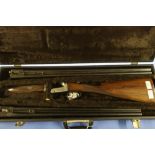 Cased Thomas Bland and Son 12 bore side by side ejector shotgun with 28 inch barrels, and second set