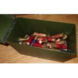 Military style ammo tin containing a quantity of various assorted 8 bore shotgun cartridges