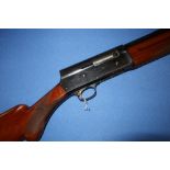 12 bore Browning A5 "Light Twelve" semi auto shotgun, with 25 inch barrel, with engraved detail to