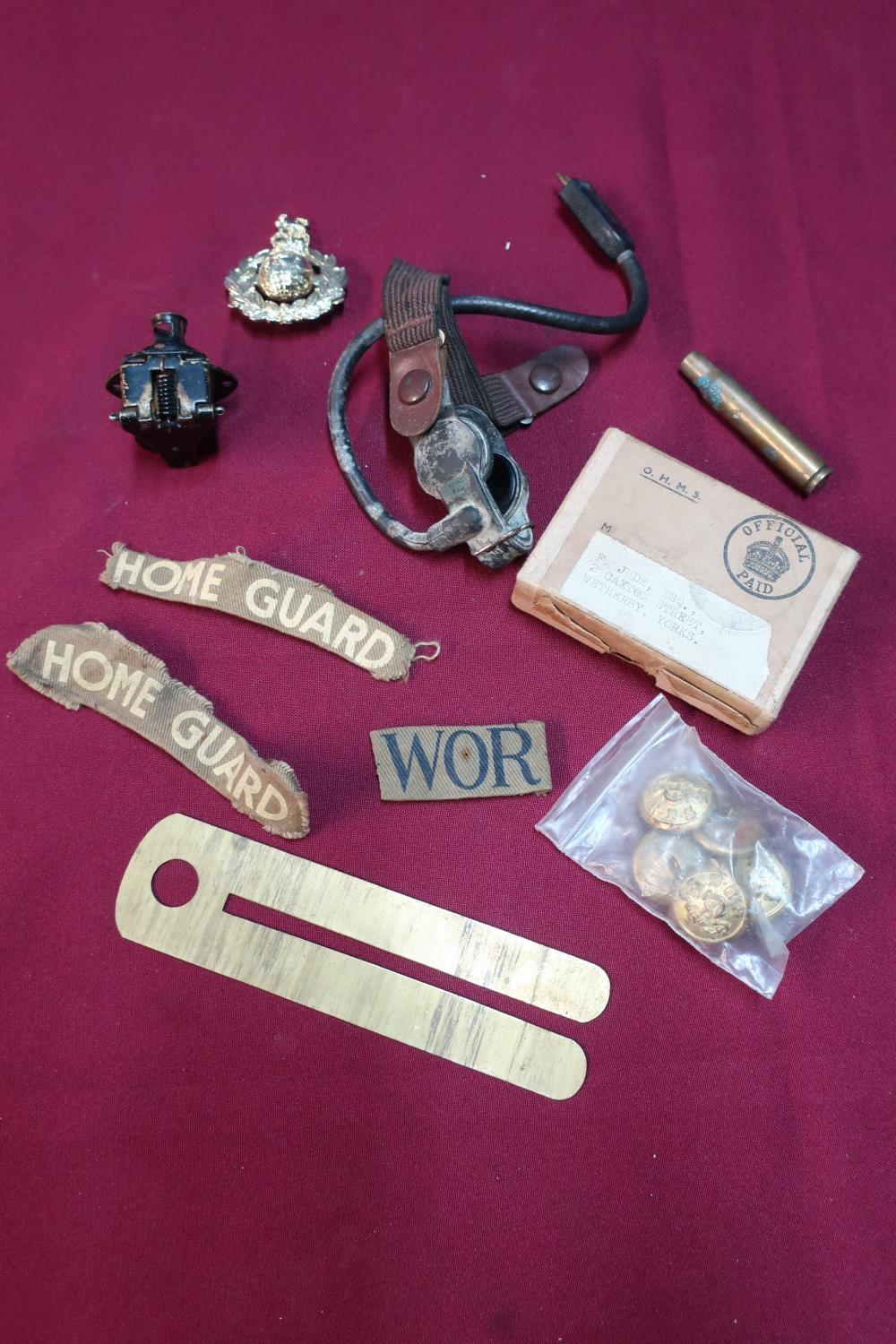 Small selection of various militaria including a medals postage box, a WW2 American throat